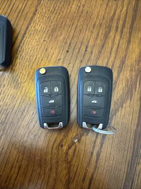 16089 Chevrolet Chevy Oem Malibu Impala Camaro Cruze Switchblade Keys Used