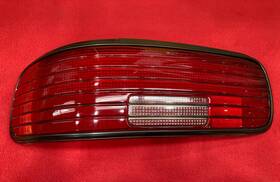 16522451 Chevrolet Gm Oem Tail Lamp Lens Black Bezel Driver Rear 94-96 Chevy Impala Nos