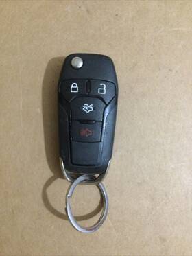 100132 Ford 02108 13-16 Fusion Key Fob W Lock Unlock Trunk And Alarm Buttons Oem Used No