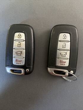Hyundai I/4br Pair Of Oem 4 Button Key Fobs Both With