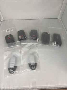 12987431281 Toyota Highlander /nissan Key Fob Lot Of 7