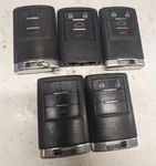 Lot Of 5 Oem Cadillac Standard Keyless Entry Fob OUC6000066 4 Buttons. Fixed Price $60.00.