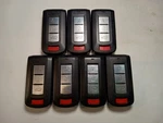 Lot Of 7 Oem Mitsubishi Smart Fob Remotes OUC644M-KEY-N Buttons. Fixed Price $105.00.