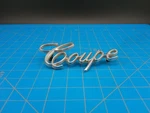 Vintage Cadillac Coupe Script Emblem Badge Chrome 70S Metal 9691395. Fixed Price $21.99.