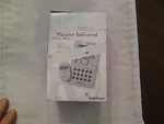 Radio Shack Passive Infrared Sensor Alarm With Key Chain Remote 49-329. Fixed Price $19.95.