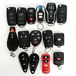 Lot Of 15 Keyless Entry Fob Remotes Various Manufacturers. Fixed Price $50.00.