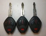 Lot Of 3 Oem Mitsubishi Head Key Fob Remotes OUCG8D-620M-A Buttons. Fixed Price $90.00.
