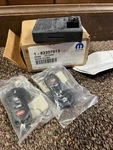 New Genuine Nos Mopar 82207513 Keyless Entry Kit With Keyfobs. Fixed Price $185.00.