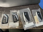 Lot Of 4 Oem Bmw Smart Fobs Genuine Factory Keys Untested. Fixed Price $125.00.