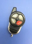 Used Omega Excalibur ELV147 #147 4-BUTTON Remote Start Alarm Transmitter Fob. Fixed Price $19.50.