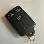 Oem Oldsmobile Remote Key Fob Transmitter ABO0104T 10205240. Fixed Price $34.88.