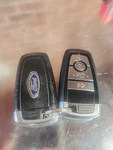 Fits Ford H87T-15K601-A Oem 4 Button Key Fob. Fixed Price $50.00.