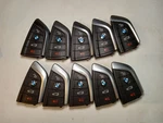 Lot Of 10 Oem Bmw Smart Key Fob Remotes N5F-ID21A 4 Buttons. Fixed Price $150.00.