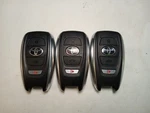 Lot Of 3 Oem Toyota Smart Key Fob Remotes HYQ14AHK Buttons. Fixed Price $135.00.