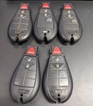 Lot Of Oem Jeep Fobik Key Remotes GQ4-53T Buttons. Fixed Price $100.00.