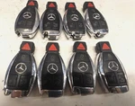 Lot Of 8 Oem Mercedes Fobik Key Remote IYZDC12 4 Button. Fixed Price $64.00.