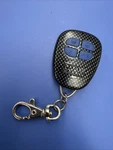 Very Nice 4-BUTTON P2020103 Alarm Transmitter Fob Carbon. Fixed Price $11.00.
