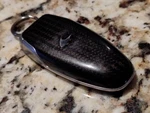 Mclaren Carbon Fiber Remote Key Fob Fcc: AQO001 (3-BUTTON). Fixed Price $850.00.