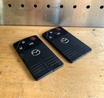 One Oem Mazda NFY7-67-5RYB BGBX1T458SKE11A01 Smart Key Fob W/ Buttons. Fixed Price $84.95.