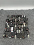 Lot Of 50 Oem/ Aftermarket Key Fobs. Fixed Price $70.00.