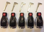 Unlocked Nklg KR55WK49O31 Mercedes Benz Lot Of Oem Smart Key Less Remote Uncut. Fixed Price $399.99.