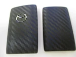 Mazda Carbon Fiber Key Fob Cover C9N1V0450. Fixed Price $46.71.