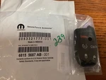 Genuine Mopar Integrated Key Fob Transmitter 68155687AB. Fixed Price $125.00.