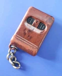 Nice 2-BUTTON Keyless Remote Transmitter Fob EZSDEI467 Brown Case. Fixed Price $17.00.