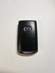 Oem Mazda 4 Button Hatch Suv Keyless Remote Smart Fob WAZSKE11D01. Fixed Price $23.00.