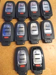 Lot Of 10 Oem Audi Smart Key Fob Remotes IYZFBSB802 4 Buttons. Fixed Price $125.00.